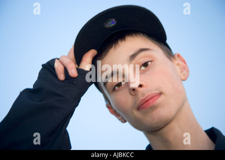 Portrait of young man wearing baseball cap Stock Photo