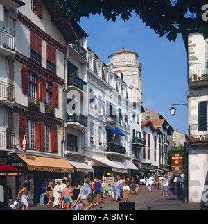 Scenic narrow street in the town of St-Jean-de-Luz on the Atlantic coast of France Stock Photo