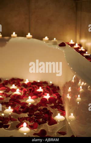 Take a bath with rose petals and candles. Romantic evening in th Stock  Photo by ©april_89 151056568
