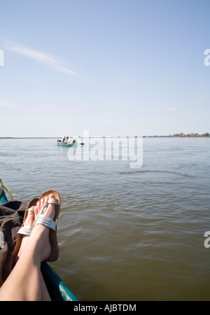 Tourists in a Canoe on the Zambezi River Stock Photo