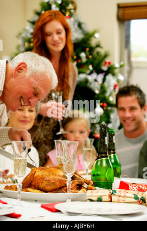 Happy Family Having Christmas Lunch Stock Photo