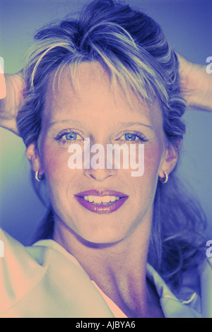 Blond woman in thirties with beautiful blue eyes Stock Photo
