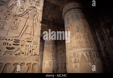 Thebes The site of Medinet Habu Egypt Columns and reliefs in the second courtyard Stock Photo