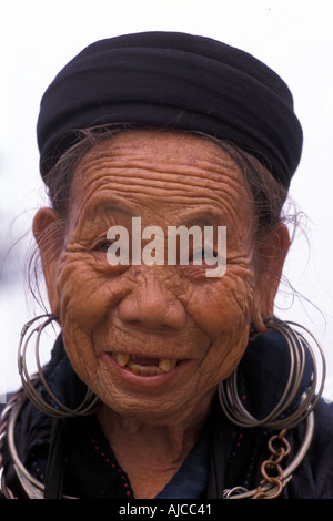 Woman from the Black Dao Dzao hilltribe in distinctive tribal costume Sapa Vietnam Stock Photo