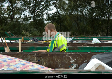Worker at the Civic Amenity Site Skelmersdale Lancashire UK Stock Photo