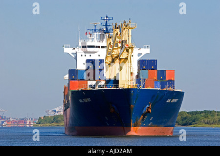 USA, Georgia, Savannah. Container ship leaving Savannah Harbor ...