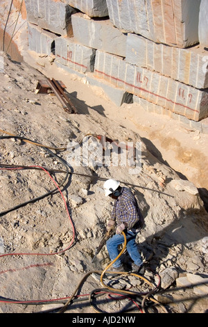 Worker drilling in a granite quarry in Elberton Georgia Stock Photo