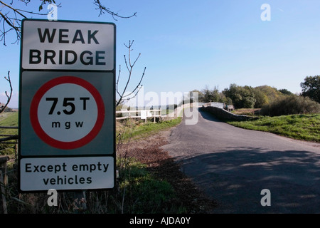 Weak Bridge warning sign on the approach to Greatham Bridge, over the River Arun at Coldwaltham, West Sussex. Stock Photo