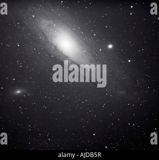 M31 or NGC 224 spiral galaxy in andromeda with companion galaxies M32 and M101 Stock Photo