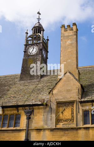 The clock tower and sundial on Redesdale Hall in the Cotswold town of Moreton in Marsh, Gloucestershire Stock Photo