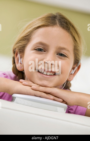 Girl Listening to Portable CD Player Stock Photo