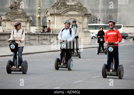 France Paris Tourists on Segway personal transporters in Place de la Concorde Stock Photo