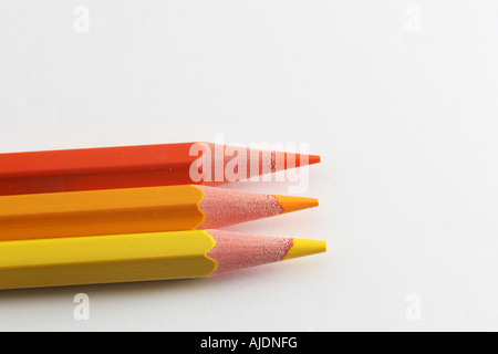 A macro shot of the front end of a group of colored pencils isolated on white Stock Photo