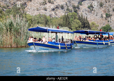 Boats with tourists on Dalyan river in Turkey Stock Photo