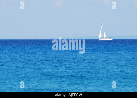 A lone yacht on the horizon of the greek mediterranean sea off the coast of Kephalonia number 2560 Stock Photo