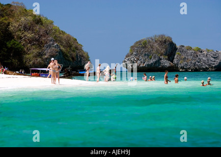 Visitors enjoy a dip in warm tropical waters around popular Ko Poda island off Ao Nang Thailand