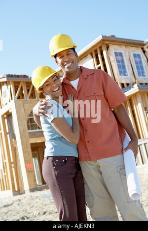 Couple on new home building site Stock Photo