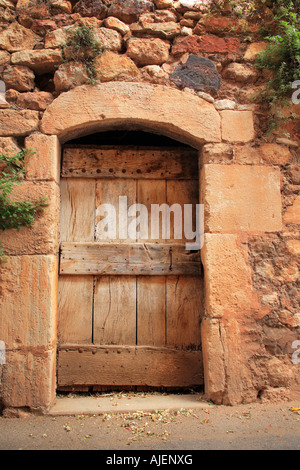 Old door in the town of Roussillon, Provence in France Stock Photo