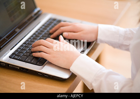 Young woman using computer Stock Photo