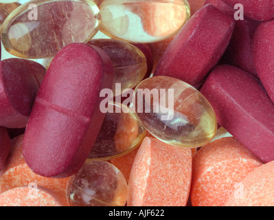 Assorted vitamins Multivitamins vitamin E gelcaps chewable vitamin C Stock Photo