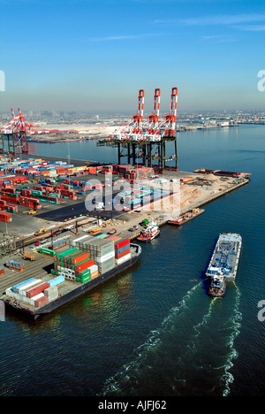 Giant Container Ships Loading And Unloading On Pier J At The Long Beach ...