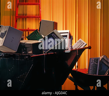 Obsolete computers discarded in a dumpster Stock Photo