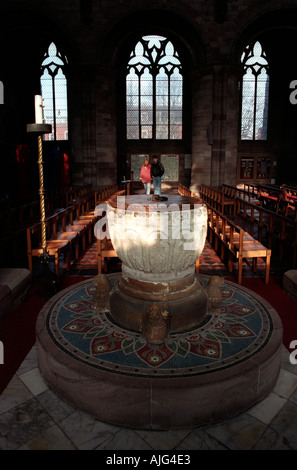 The stone font in Hereford Cathedral Stock Photo
