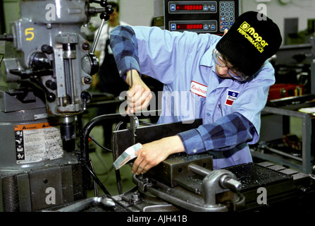 Vocational education Minority male high school students take training in Hydraulics Stock Photo