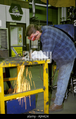 Vocational education Minority male high school students take training in Welding Stock Photo