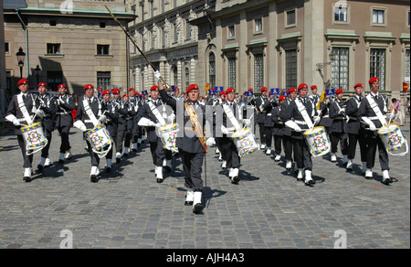 The Drummers of the Swedish Army Band with Drum Major Eugen Qvarnström marching to the Royal Palace in Stockholm for the Changing of the Guards Stock Photo