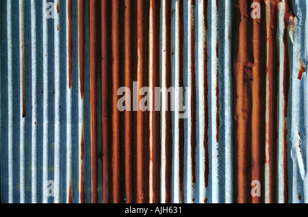 Close up of sky blue rusty corrugated iron panel Stock Photo
