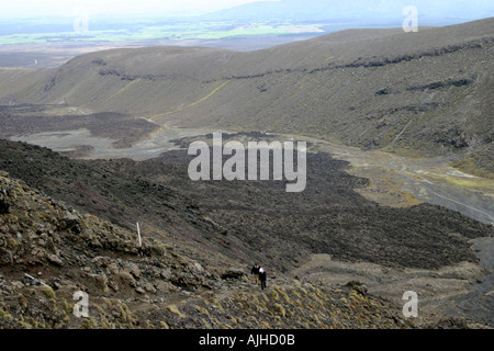 Reaching the top of Devils Staircase Tongariro Crossing National Park North Island New Zealand Stock Photo