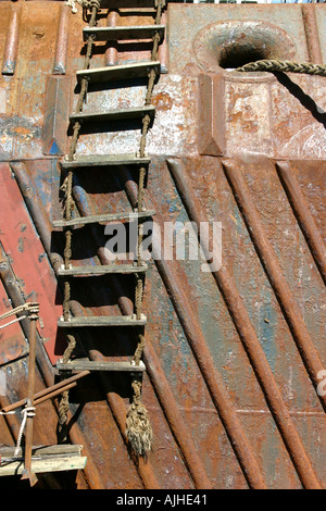 Ship s rope ladder on a rusty ship Littelton Harbour Christchurch South Island New Zealand Stock Photo