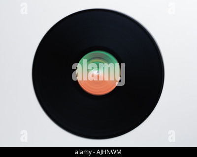 Spinning vinyl record on white background - motion blur Stock Photo