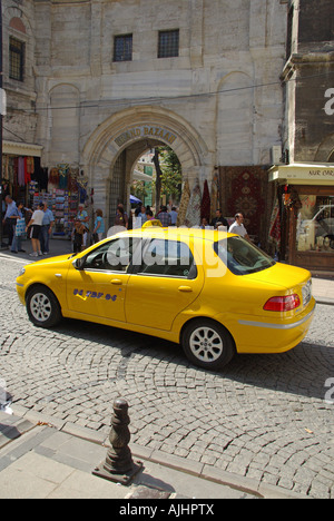 istanbul turkey yellow taxi taksi cab in front of the yeni cami new mosque at eminonu stock photo alamy