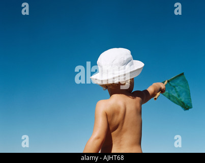 Boy with a butterfly net Stock Photo