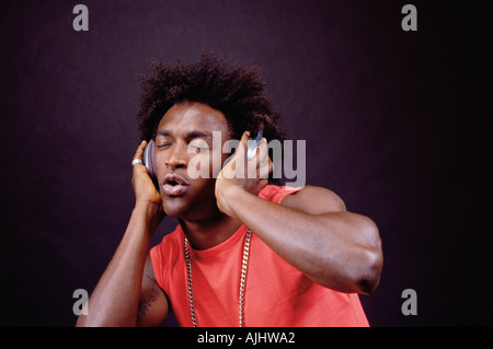 Man listening to music Stock Photo