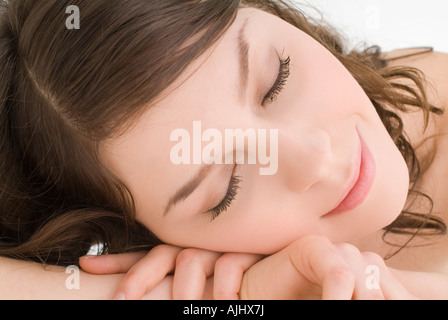 Young woman with eyes closed Stock Photo