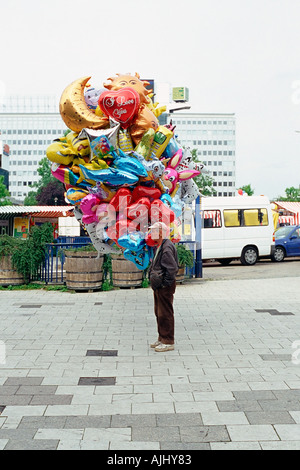 Man selling balloons Stock Photo