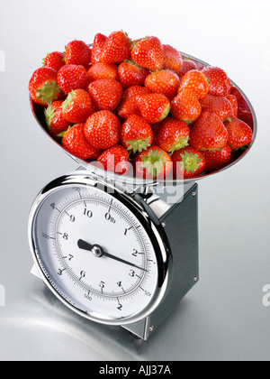 Strawberry On The Scales Stock Photo - Download Image Now - Weight Scale,  Food, Scale - iStock