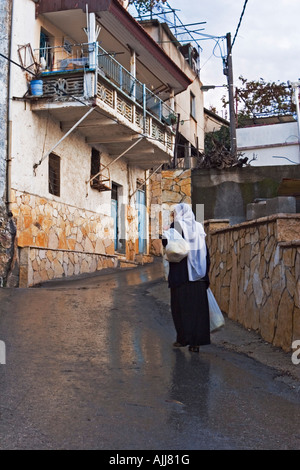 A Druze woman in traditional dress in Isfiya (also known as Ussefiya) a ...