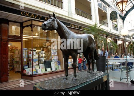 A bronze statue of Grand National winner 'Red Rum' in Wayfarers Arcade, Southport. This popular horse was trained nearby. Stock Photo