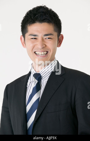 Man in business suit on white background Stock Photo - Alamy