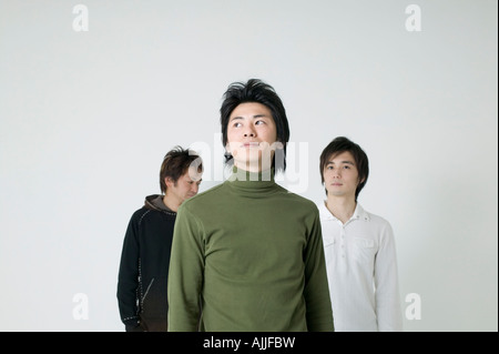 Portrait of three young Asian men together Stock Photo - Alamy