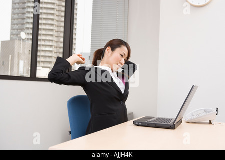 Young woman stretching Stock Photo