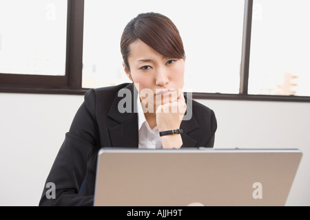 Stressed young woman Stock Photo