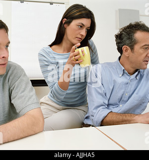 Three office workers Stock Photo