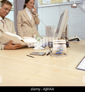Two office workers Stock Photo