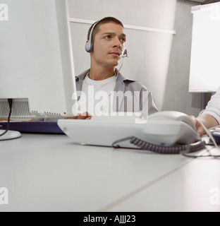 Male call centre operator Stock Photo