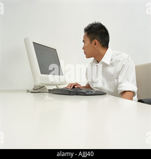 Office worker using computer Stock Photo